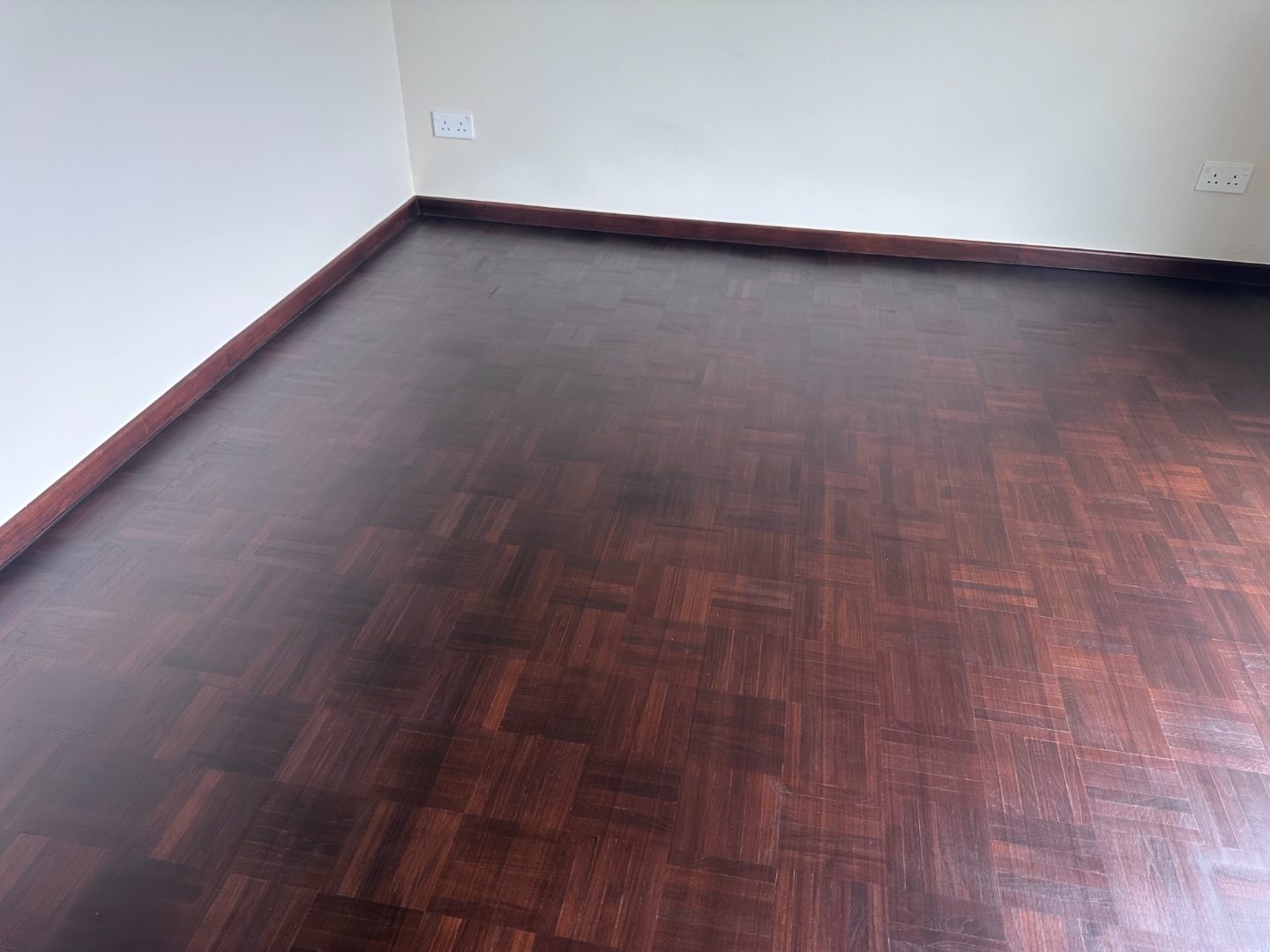 Indus Road condominium bamboo plank installation with customised varnish finish — boards laid and finished